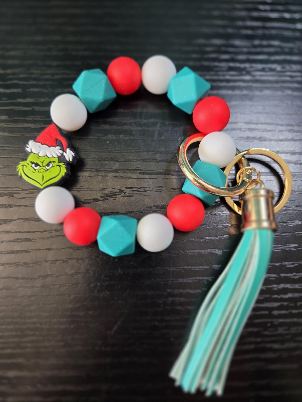 Silicone Bead Wristlet Keyring with Teal Tassel - Grinch Charm